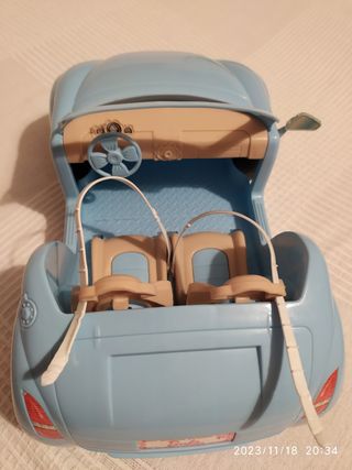 Coche muñecas