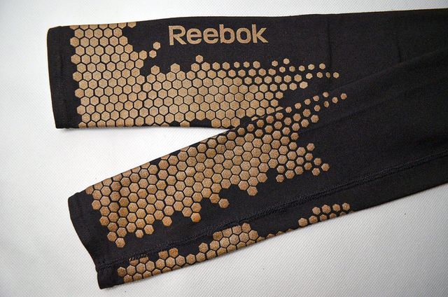 Manicotti compressione Reebok per sport