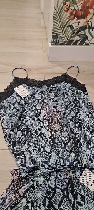 Pijama tezzenis talla L nuevo 