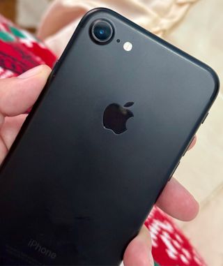 Iphone 7 negro + 18 fundas