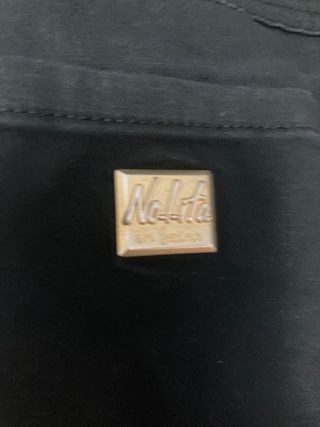 Pantalón Nolita talla 27 campana tiro bajo