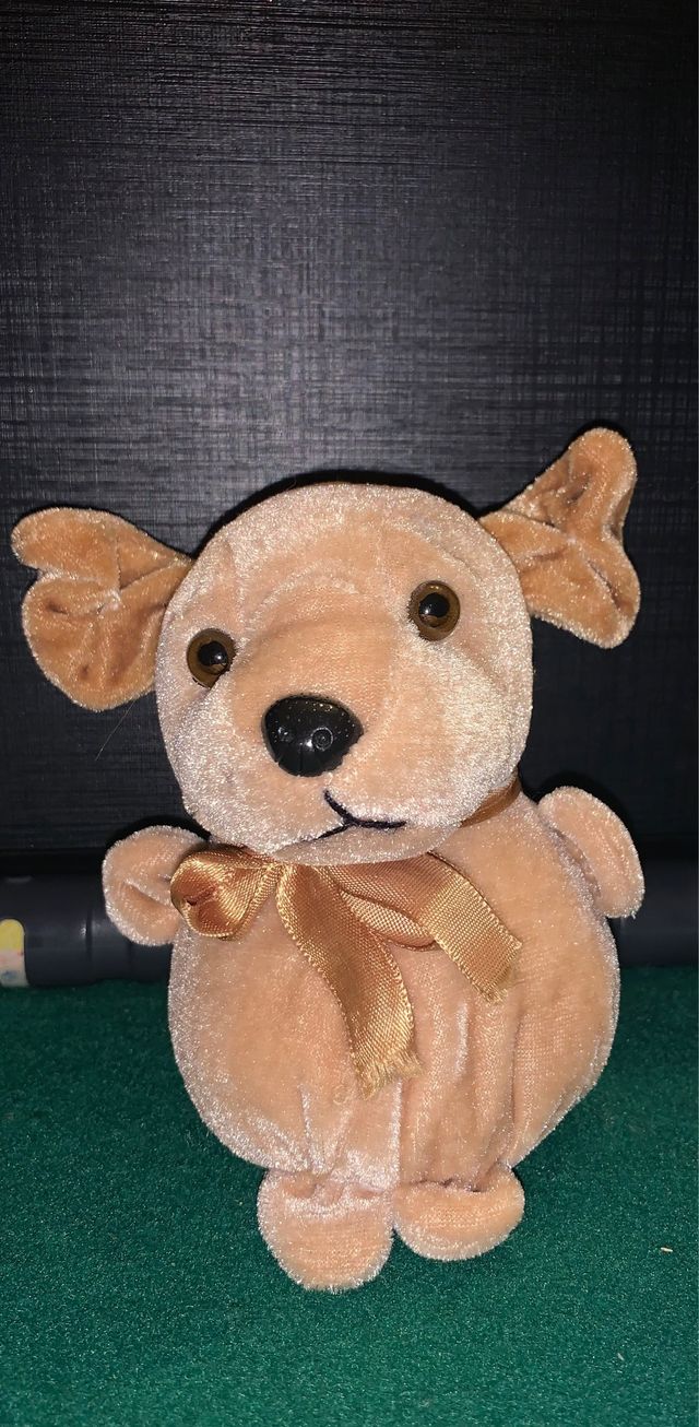 Peluche beige cane