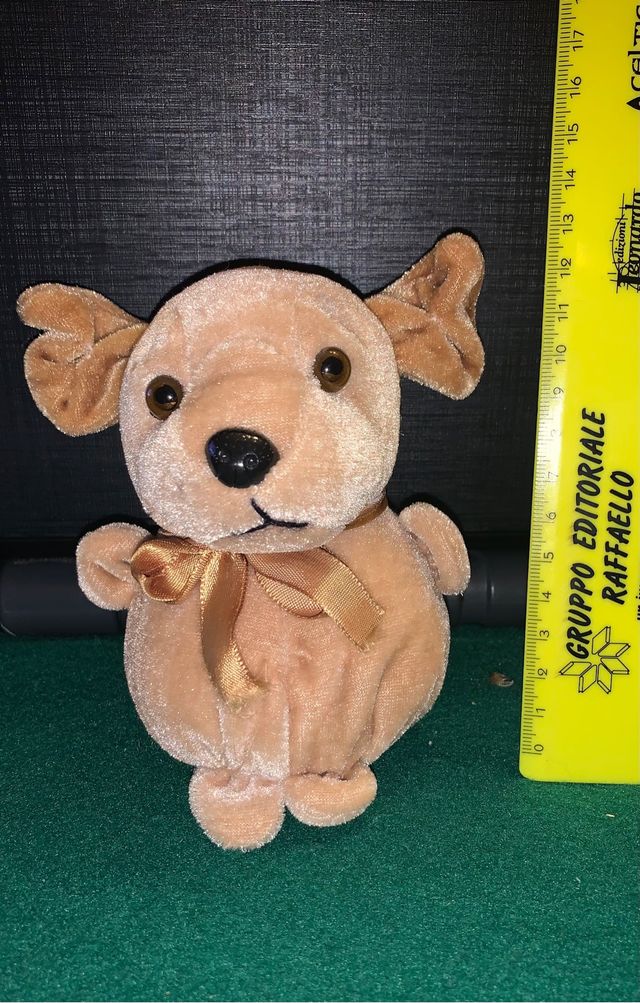 Peluche beige cane