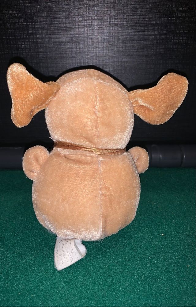 Peluche beige cane