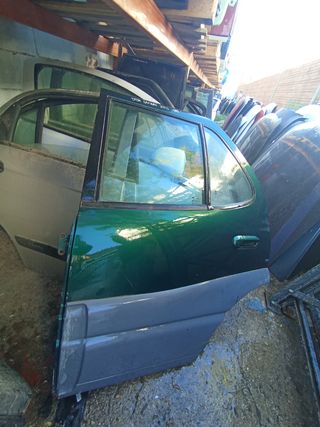 Puerta trasera izquierda tata safari 2005