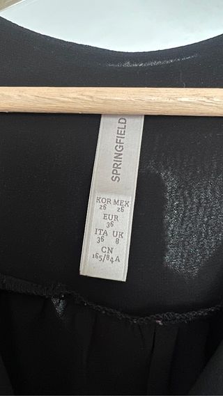 Blusa negra semitransparente