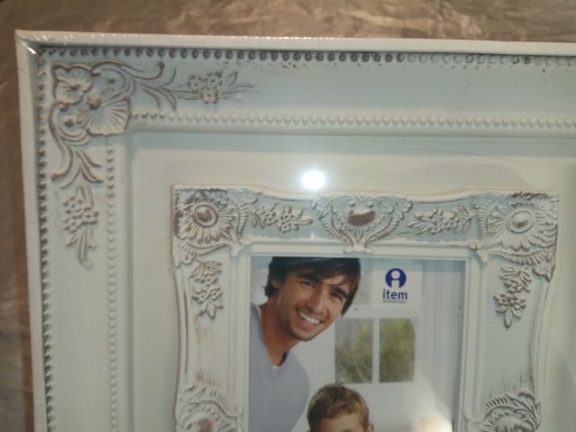 Marco multifoto pared envejecido (detalle)