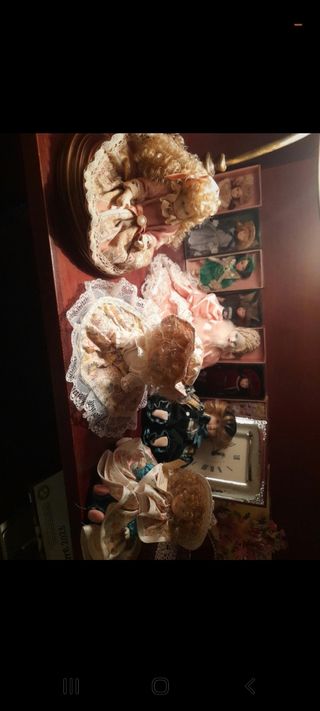 Bambole ceramica e tessuto