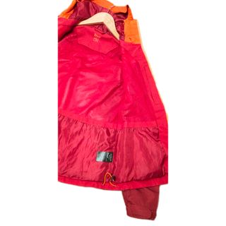 Abrigo fino granate y naranja