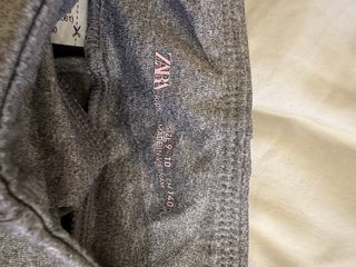 Camiseta y mallas deportivas de niña de Zara