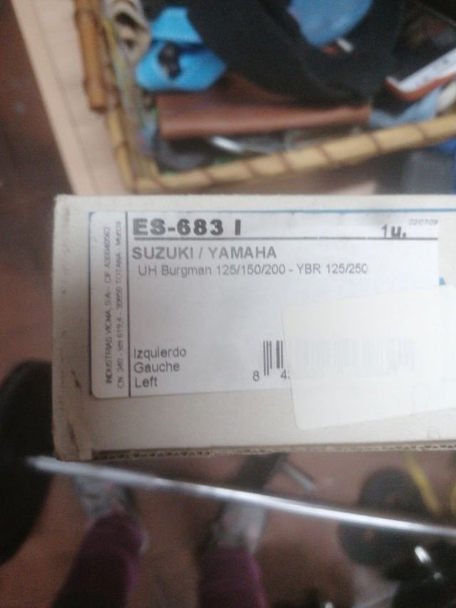 Retrovisor. Moto. Pareja 