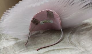 Tocado pelo mediano rosa/salmón