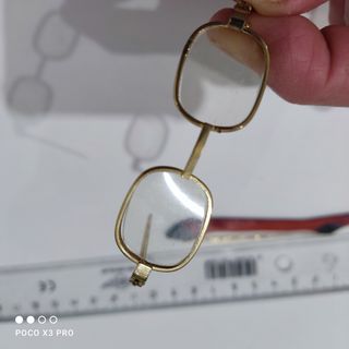 Miniatura de violín y arco madera y gafa