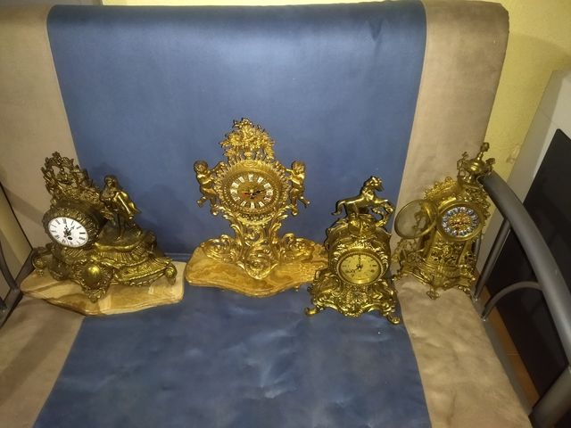 4 orologi antichi realizzati in.. bronzo.