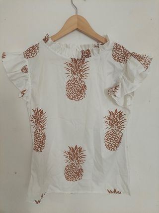 Blusa blanca sin mangas