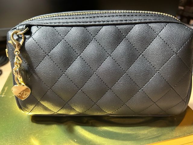 Bolsito de mano de uso multiple