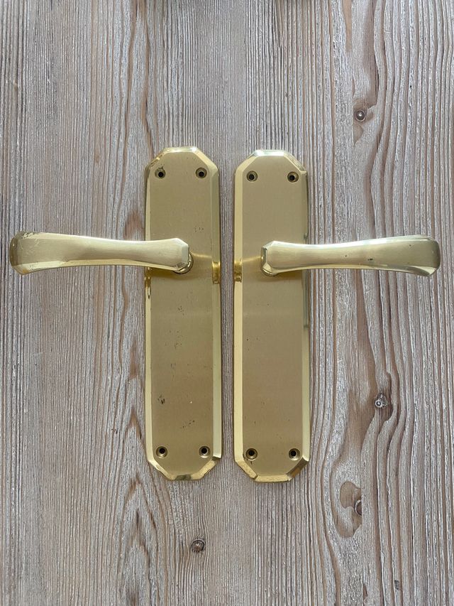 Manillas para puerta de bronce dorado