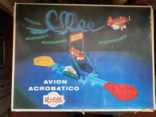 Juego antiguo avión acrobático Rico