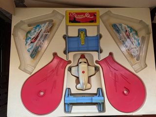 Juego antiguo avión acrobático Rico