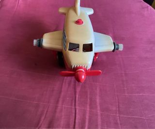 Juego antiguo avión acrobático Rico