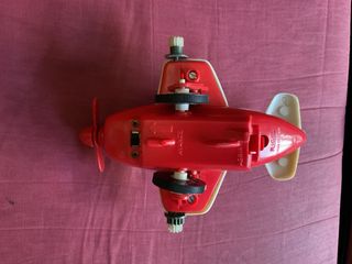 Juego antiguo avión acrobático Rico