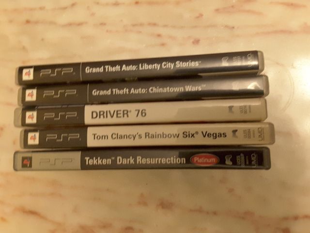 PSP completa +5 juegos pal+cargador+2 fundas