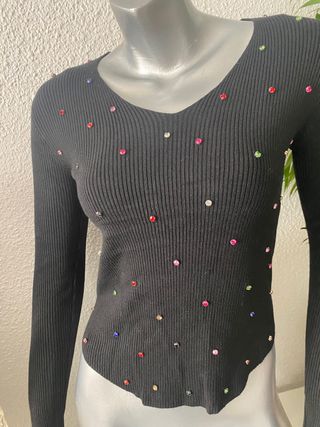 Blusa punto canale pedreria .