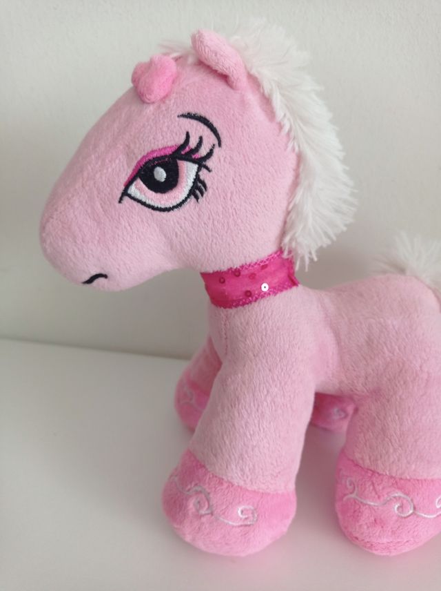 Juguete peluche pony rosa con sonido 20 cm