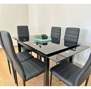 Mesa con cristal extensible y 6 sillas polipiel