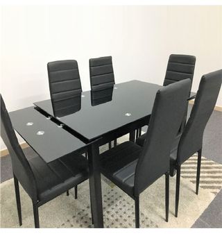 Mesa con cristal extensible y 6 sillas polipiel