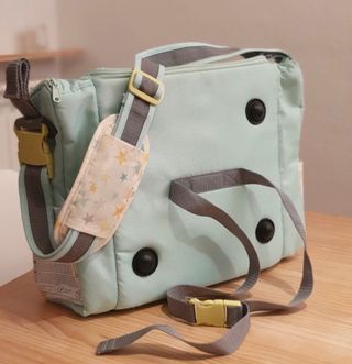 trona de viaje portatil con alzador