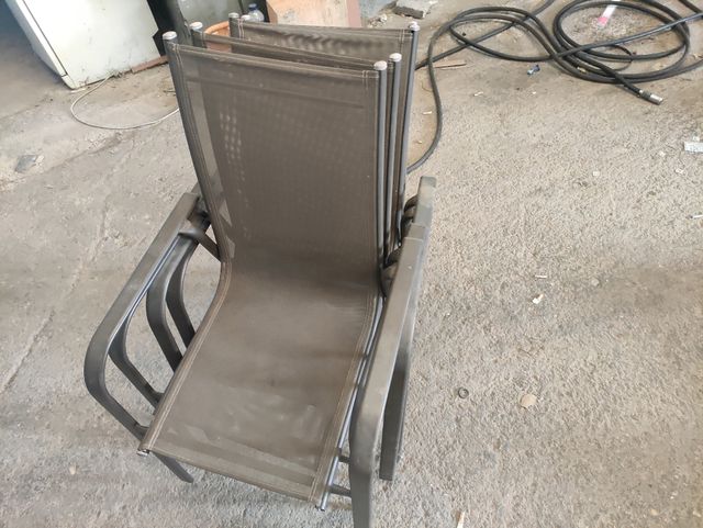 Mesa de cristal con sus sillas  de Aluminio