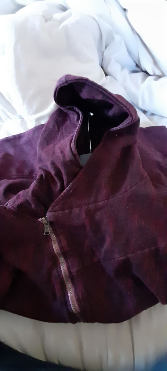 Felpa con cerniera obliqua