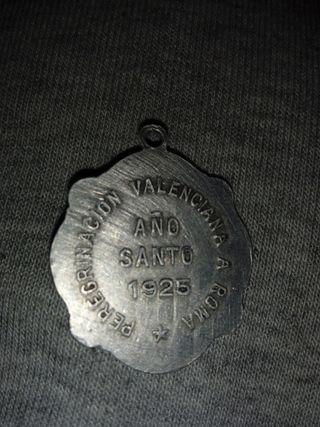 Medalla antigua de 100 años