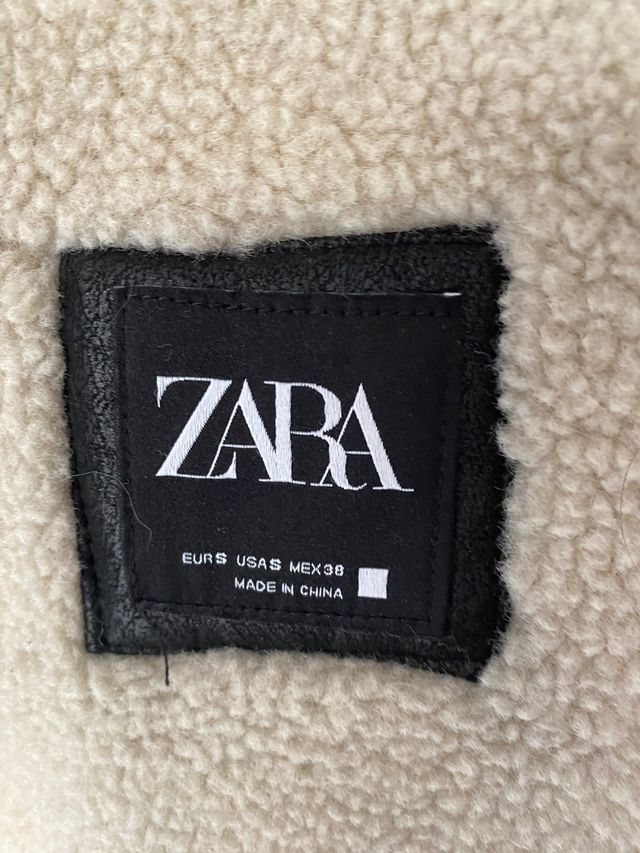 Abrigo de borrego y piel sintética