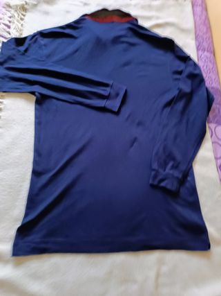 Polo Lacoste manga larga con bolsillo