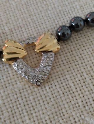 Collana in ematite e gancio in argento . Vintage