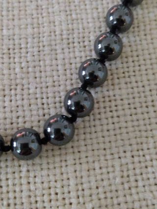 Collana in ematite e gancio in argento . Vintage