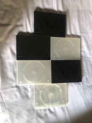 cajas DVD plastico. NEGRAS Y TRANSPARENTRES
