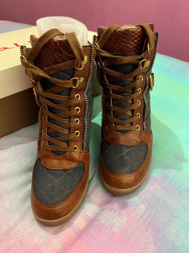 botin vaquero cuña salsa.