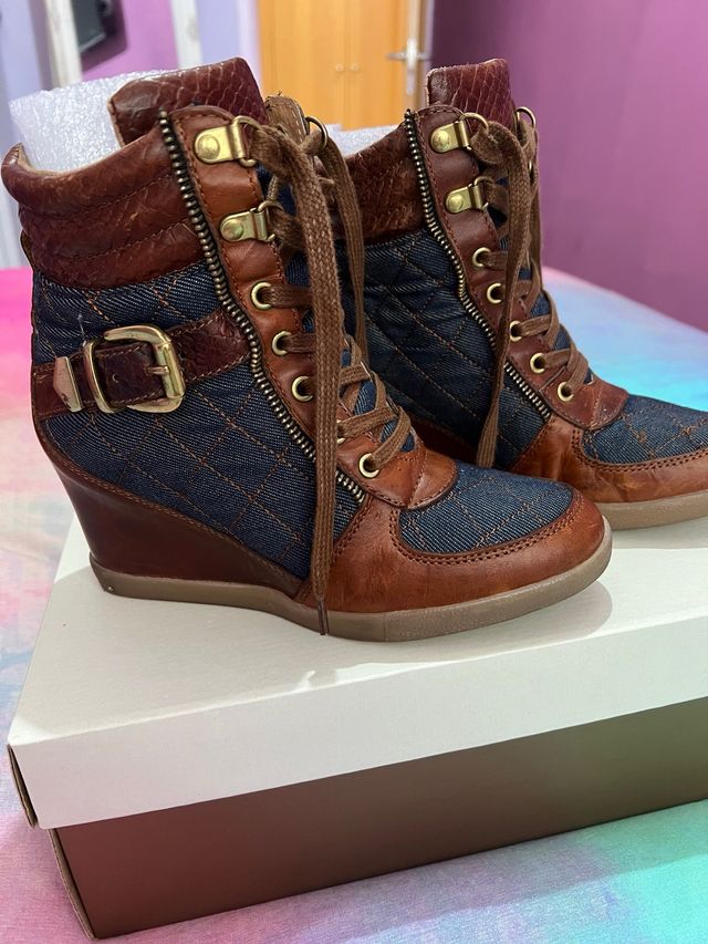 botin vaquero cuña salsa.