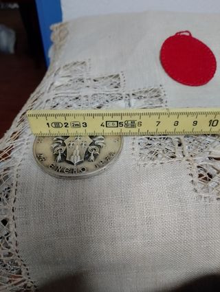 Conjunto Detente y Medalla.