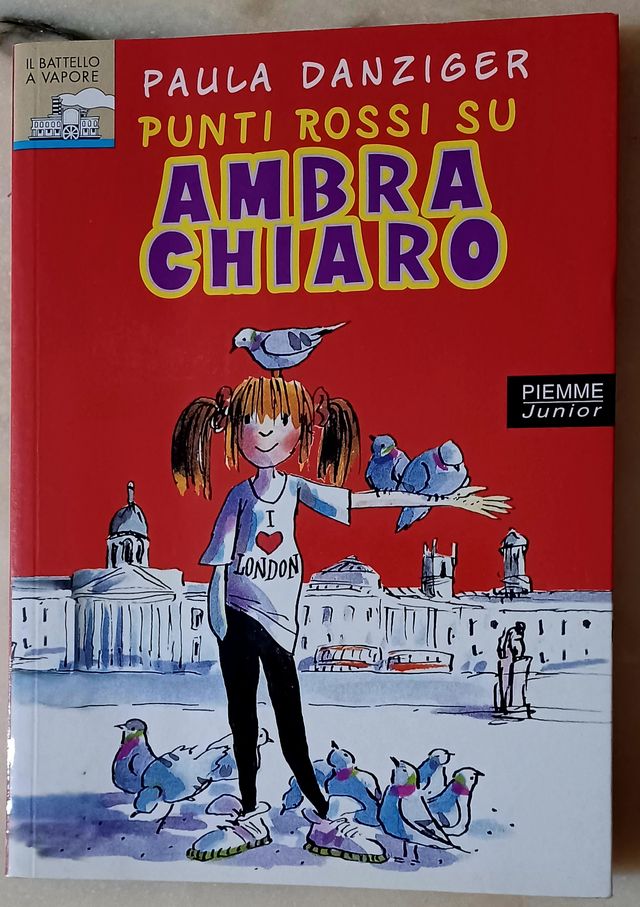 Punti rossi su Ambra Chiaro