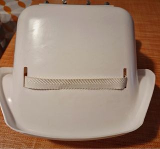 Seggiolino bianco per bicicletta