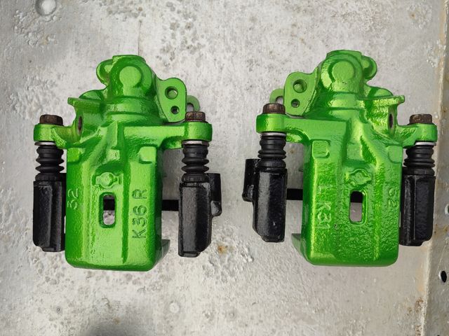 NISSAN 200SX S14 REAR CALIPERS NEW PISTONS RECON