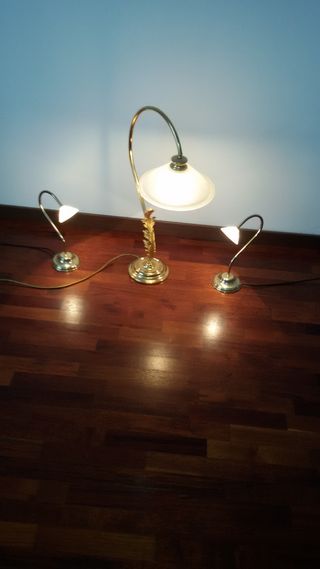 Tris di lampade in ottone dorato