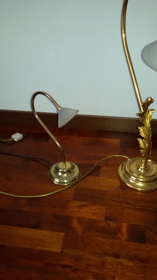 Tris di lampade in ottone dorato