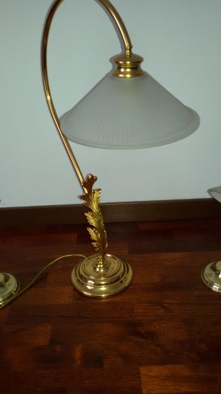 Tris di lampade in ottone dorato