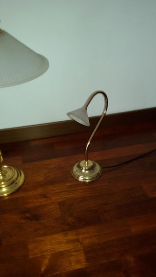 Tris di lampade in ottone dorato