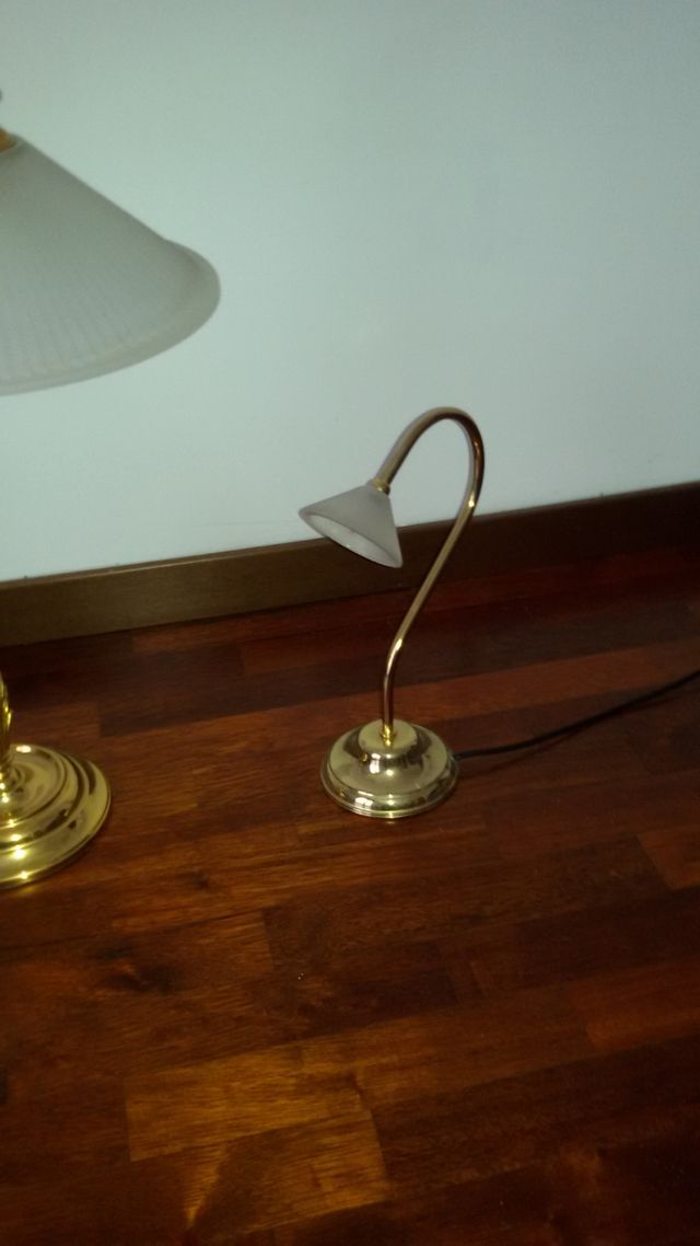 Tris di lampade in ottone dorato